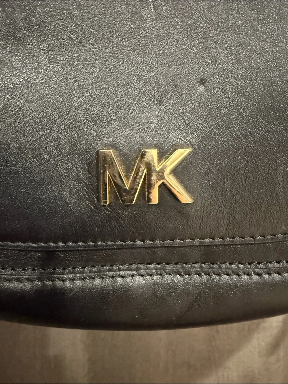 ⁠MICHAEL KORS Jolene black leather saddle bag with interlocking woven strap